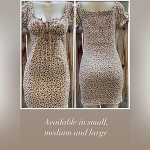 Floral smocked dress available in small, medium and large